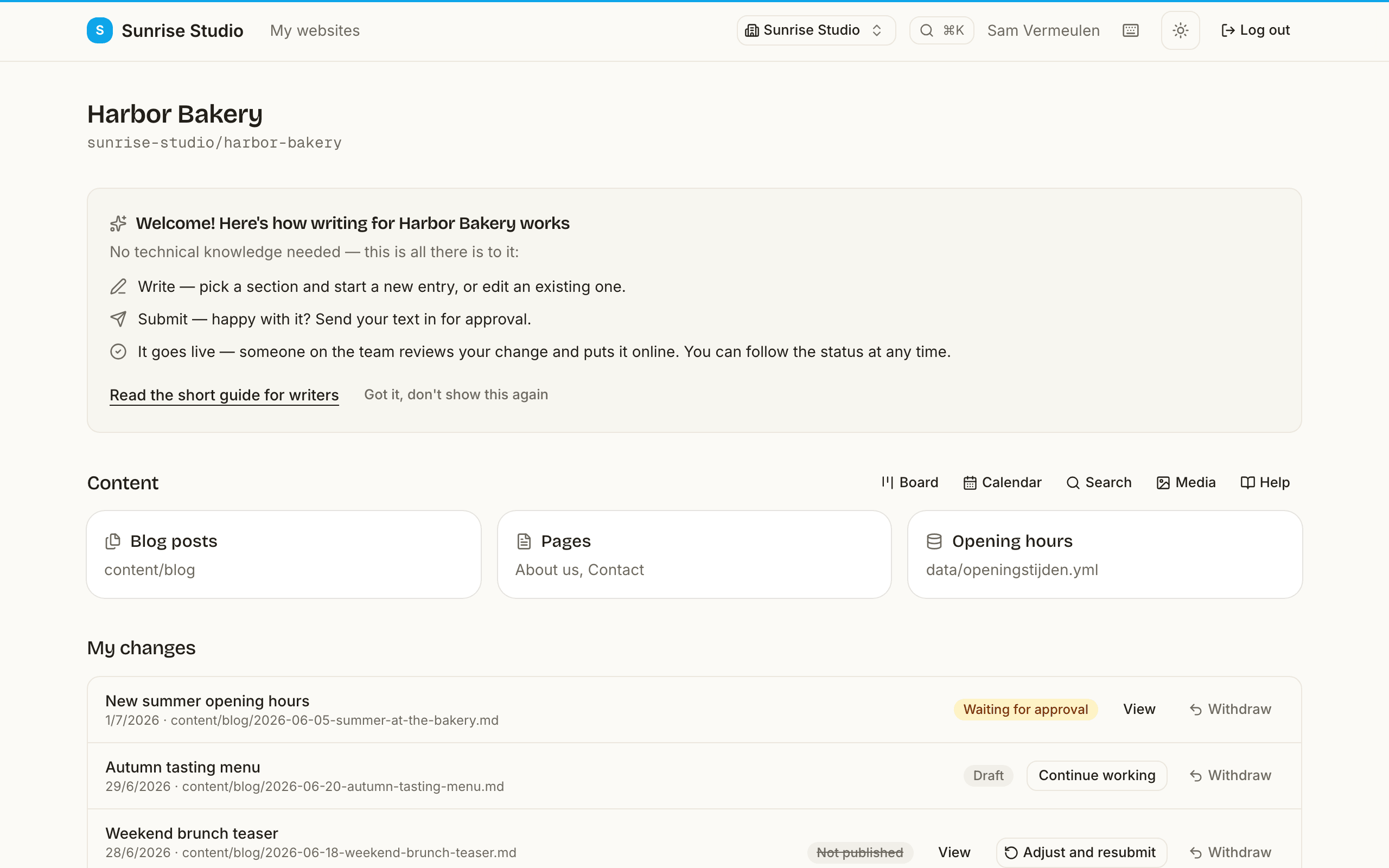A site page with the panel “Welcome! Here's how writing for Harbor Bakery works”, listing the three steps write, submit, it goes live, above the site's collections and the writer's own changes with status badges