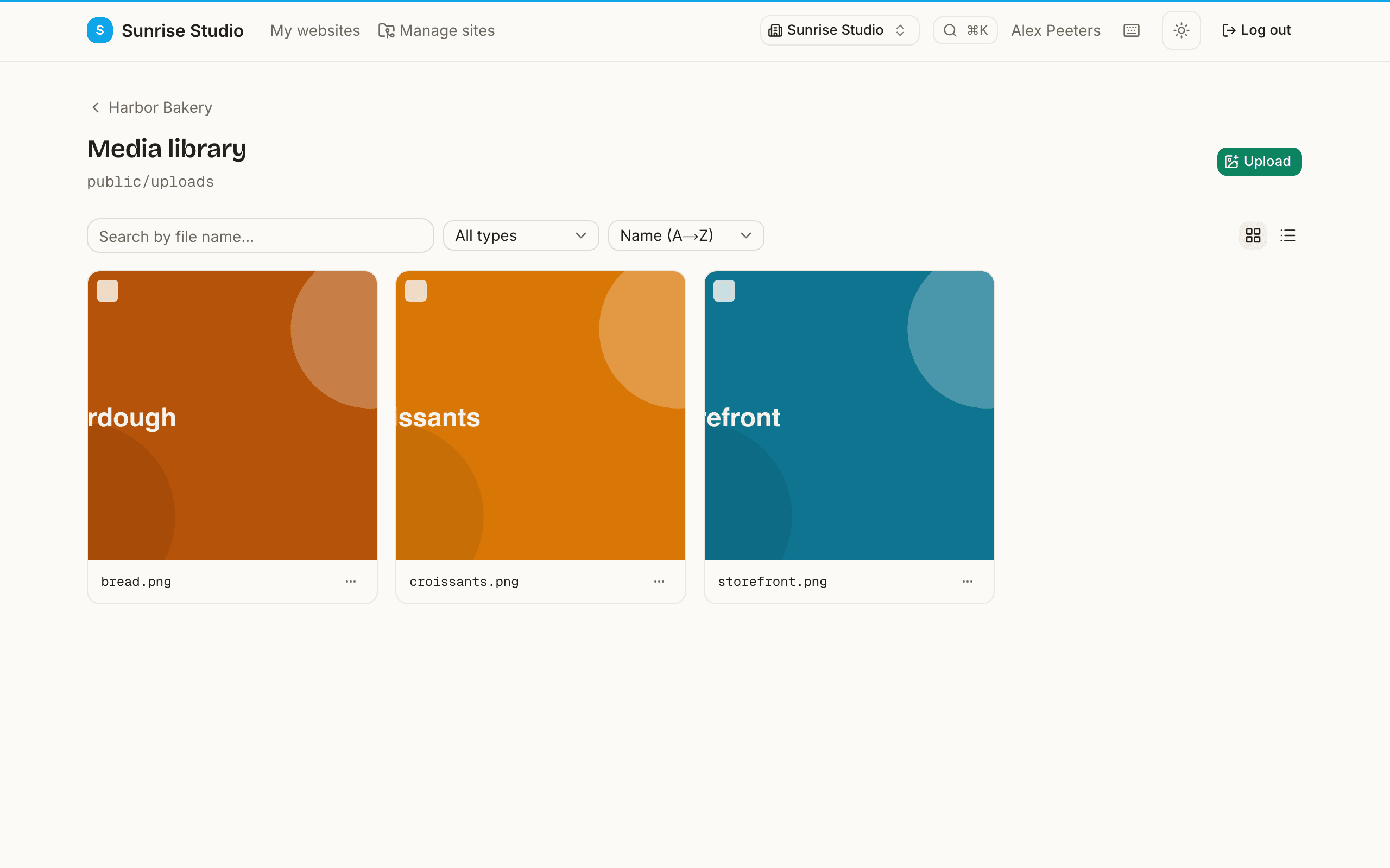 A site's Media library showing a grid of uploaded images with their file names, a search box, a type filter and a sort selector